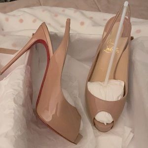 Brand new, never worn Christian Louboutin CLB red bottom stiletto heels